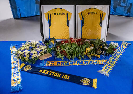 Jerseys with the names of the two victims of the terror