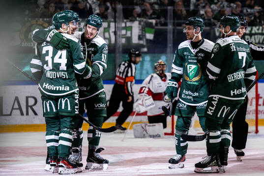 Färjestads Michael Lindqvist och Joakim Nygård jublar