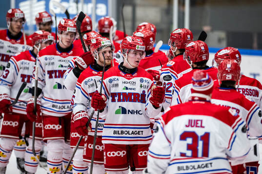 Timrås spelare jublar