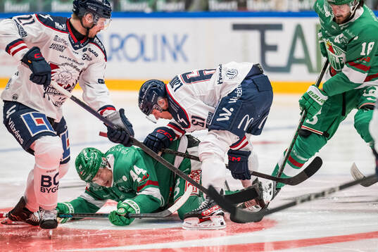 Rögles Jacob Peterson och Linköpings Markus Ljungh