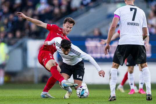 Felix Horn Myhre of Brann and Moustafa Zeidan of Rosenborg
