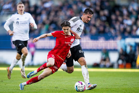 Ulrik Mathisen of Brann and Tomas Nemcik of Rosenborg