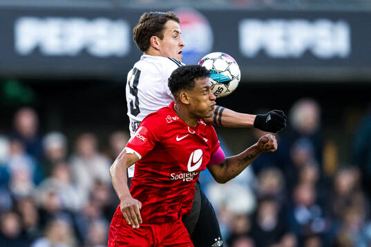 Ole Sæter of Rosenborg and Japhet Sery Larsen of Brann