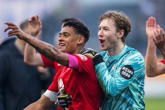 Japhet Sery Larsen and Mathias Dyngeland of Brann celebrates