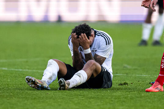 Noah Jean Holm of Rosenborg looks dejected