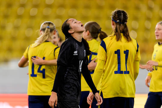 Zhansezim Aissapar of Kazakhstan looks dejected