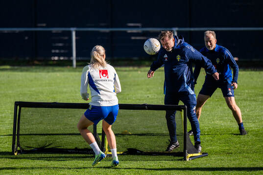 Josefine Rybrink and head coach Peter Gerhardsson of the