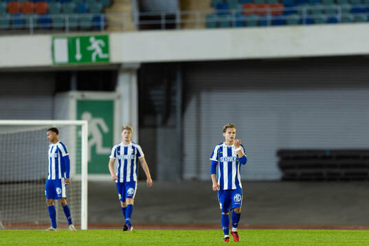 Players of IFK Göteborg look dejected