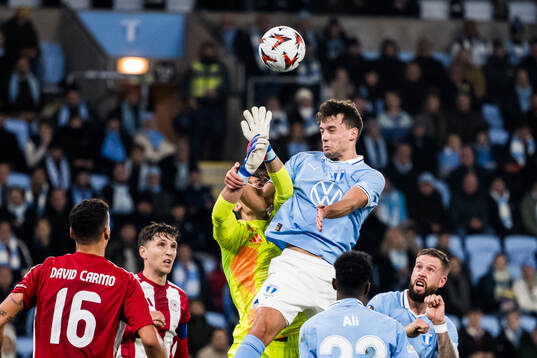 Colin Rösler of Malmö FF and Kostas Tzolakis of Olympiacos