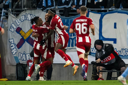 Ayoub El Kaabi of Olympiacos celebrates