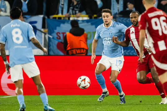 Colin Rösler of Malmö FF and Ayoub El Kaabi of Olympiacos