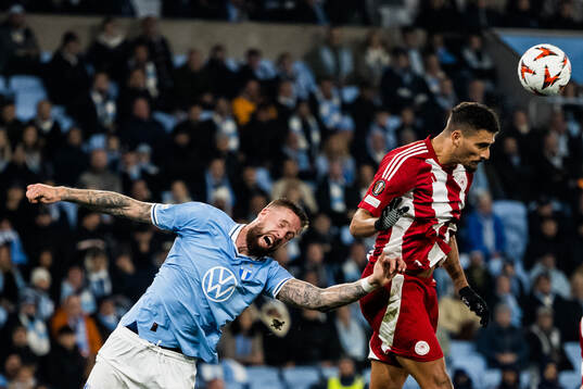 Pontus Jansson of Malmö FF and David Carmo of Olympiacos