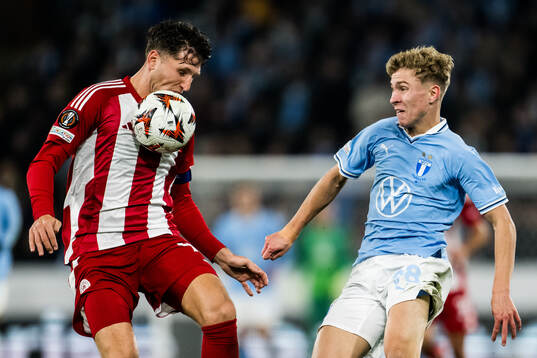 Panagiotis Retsos of Olympiacos and Hugo Bolin of Malmö FF
