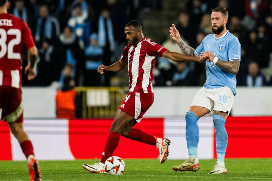 Ayoub El Kaabi of Olympiacos and Pontus Jansson of Malmö FF