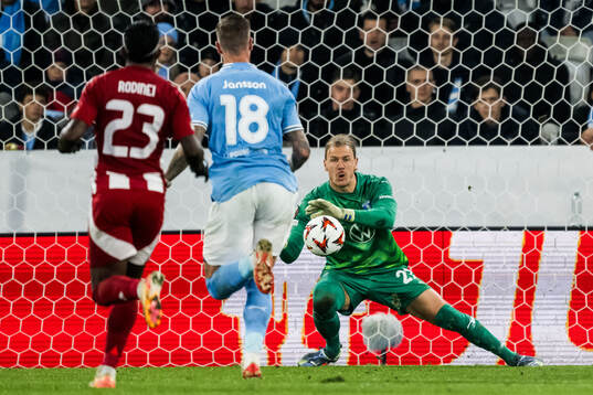 Johan Dahlin of Malmö FF and Ayoub El Kaabi of Olympiacos