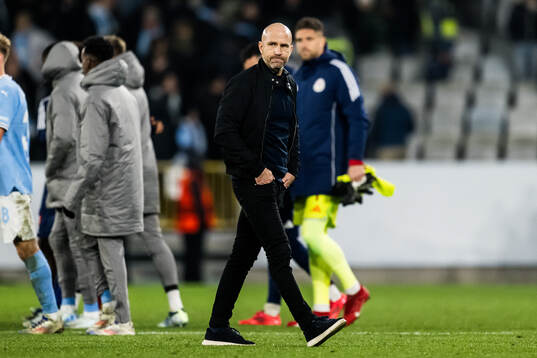 Head coach Henrik Rydström of Malmö FF looks dejected