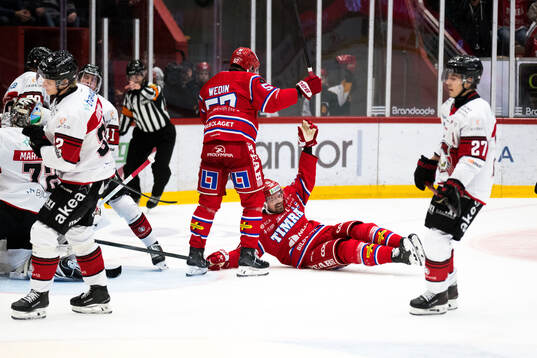 Timrås Anton Wedin och Anton Lander jublar