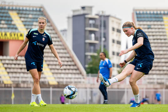 Ada Hegerberg and Signe Gaupset of the Norwegian women's