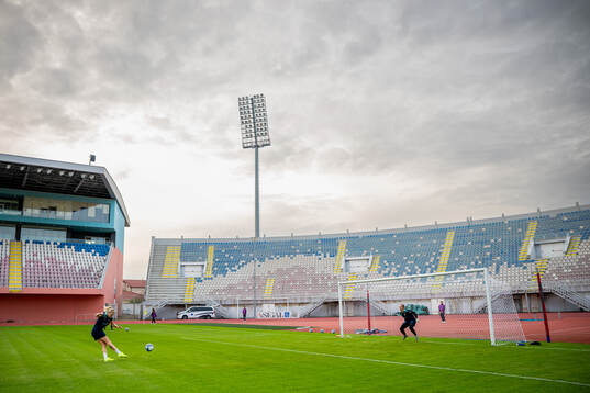 Ada Hegerberg and goalkeeper Aurora Mikalsen of the