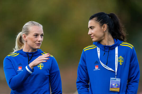 Stina Blackstenius and goalkeeper Zecira Musovic of Sweden