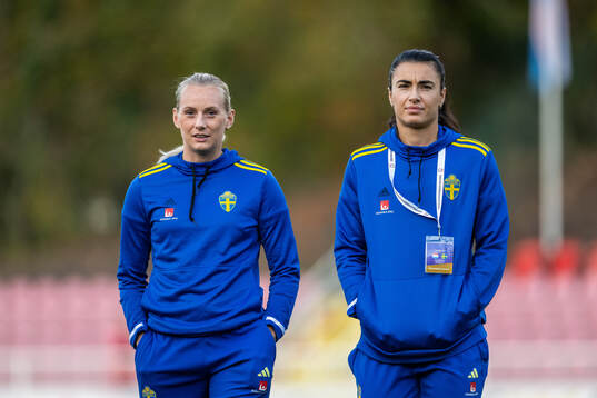Stina Blackstenius and goalkeeper Zecira Musovic of Sweden