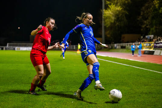 Leila Schmit of Luxembourg and Kosovare Asllani of Sweden