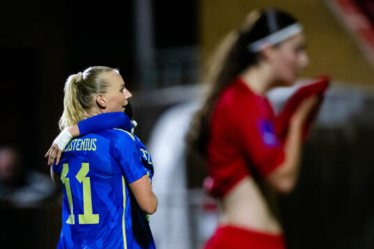 Stina Blackstenius and Kosovare Asllani of Sweden celebrate
