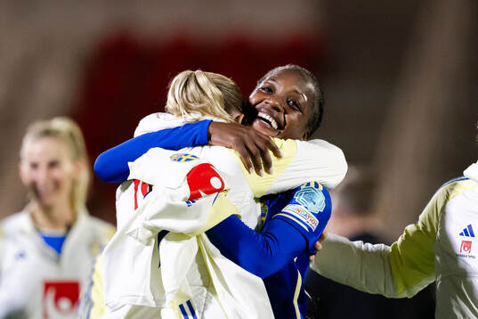 Fridolina Rolfö and Evelyn Ijeh of Sweden celebrate