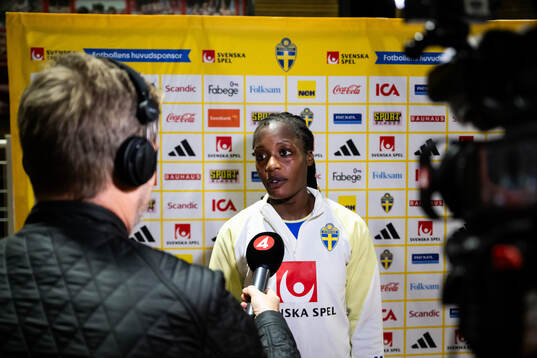 Evelyn Ijeh of Sweden is interviewed