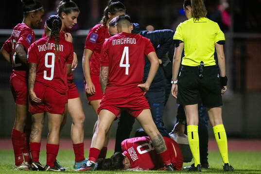 Edina Kocan of Luxembourg in pain