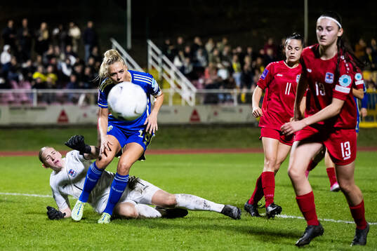 Goalkeeper Lucie Schlime of Luxembourg and Fridolina Rolfö