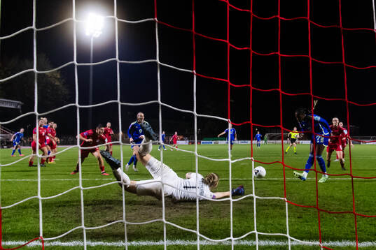 Evelyn Ijeh of Sweden scores 0-4 behind goalkeeper Lucie