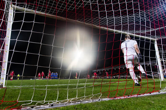 Goalkeeper Lucie Schlime of Luxembourg looks dejected