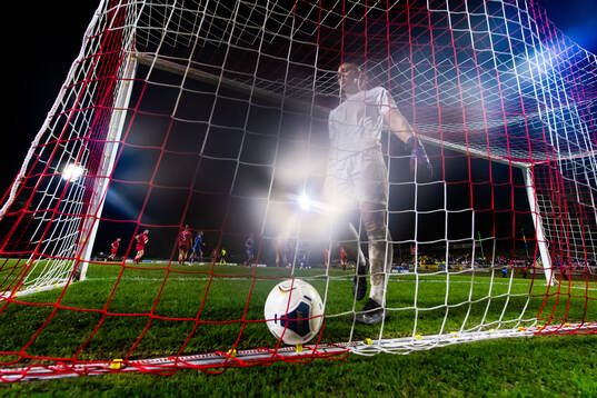 Goalkeeper Lucie Schlime of Luxembourg looks dejected