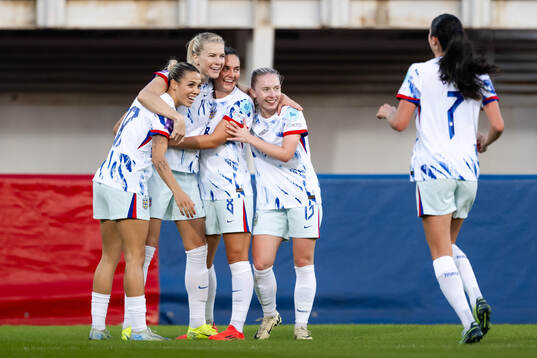 Ada Hegerberg of Norway celebrates with teammates