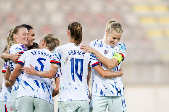 Caroline Graham Hansen and Ada Hegerberg of Norway celebrate