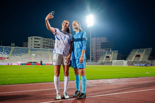 Ingrid Syrstad Engen and goalkeeper Cecilie Fiskerstrand of