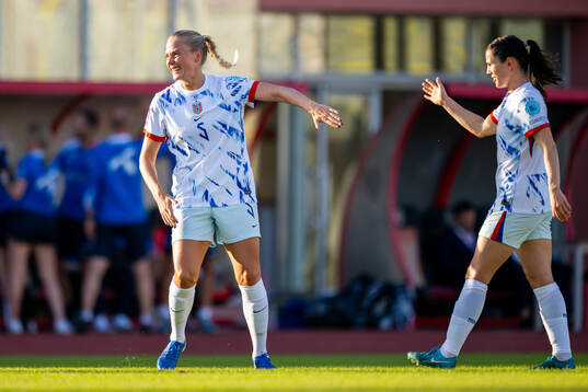 Guro Bergsvand of Norway celebrates with teammate Tuva