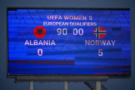 The scoreboard shows the result