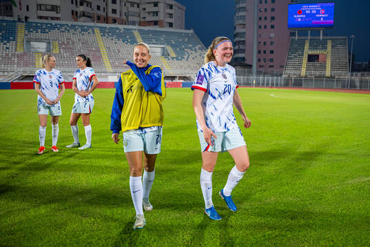 Lisa Naalsund and Signe Gaupset of Norway celebrate