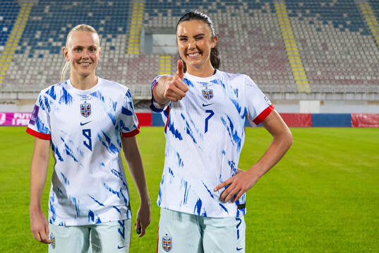 Karina Sævik and Ingrid Syrstad Engen of Norway celebrate