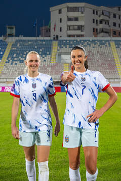 Karina Sævik and Ingrid Syrstad Engen of Norway celebrate