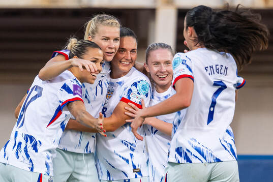 Ada Hegerberg of Norway celebrates with Celin Bizet