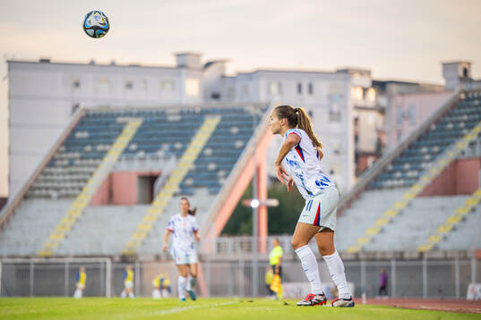 Guro Reiten of Norway takes a throw in