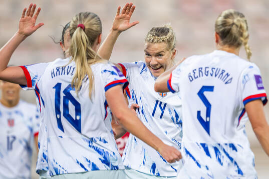 Mathilde Harviken of Norway celebrates with Ada Hegerberg