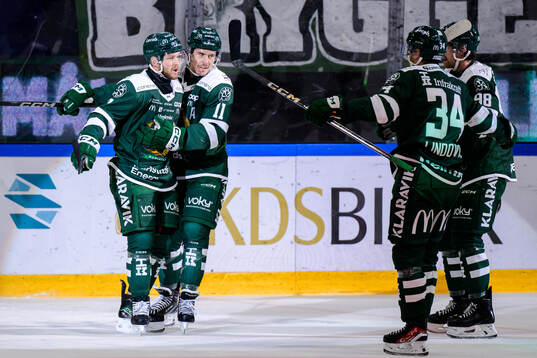 Färjestads Axel Bergkvist och Joakim Nygård jublar