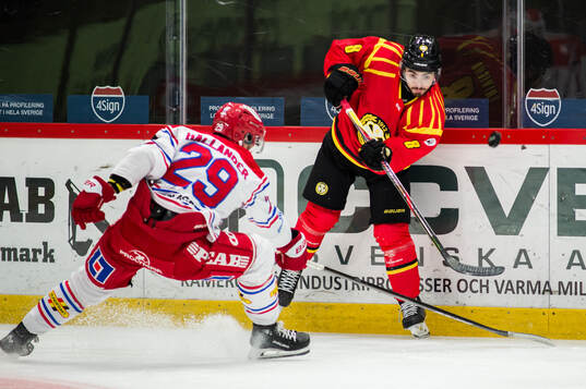 Timrås Filip Hållander och Brynäs Bobby Trivigno
