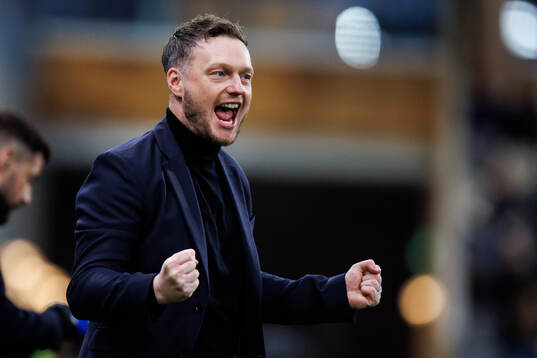 Hammarbys tränare Kim Hellberg jublar