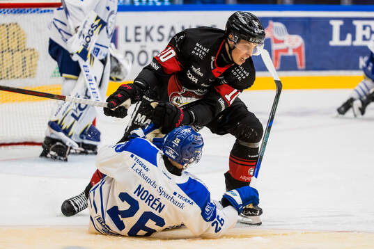 Leksands Patrik Norén och Malmö Redhawks Henrik Haapala