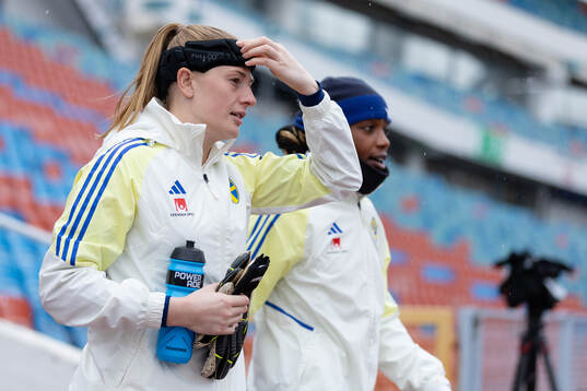 Goalkeeper Tove Enblom and Evelyn Ijeh of the Swedish